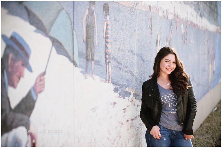 Girl along mural in West Seattle