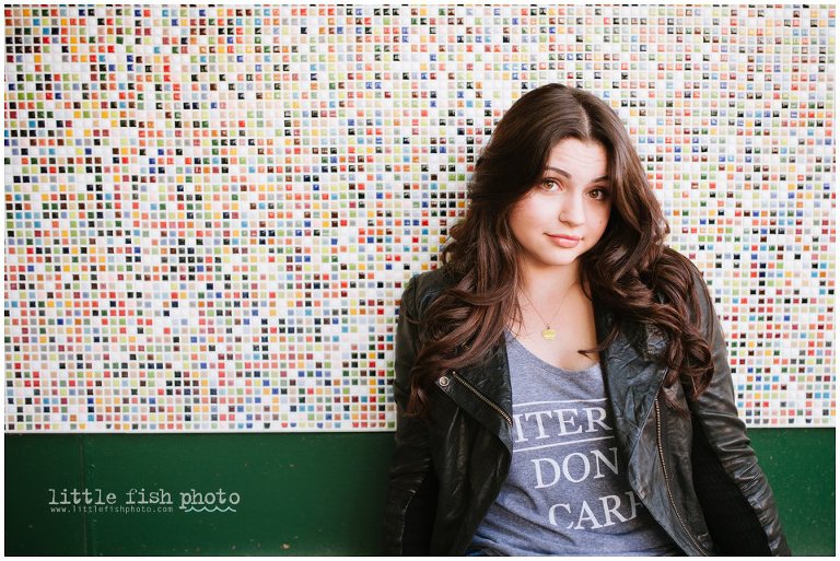 high school girl and mosaic wall on Alaska Junction West Seattle