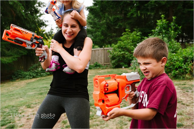 mother and son have shoot nerf guns together - Poulsbo Lifestyle & Documentary Family Photograher